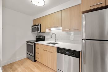 Minimalist kitchen with warm tones